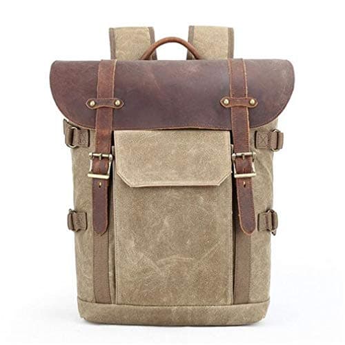 La mochila de cuero y lona para fotos con un compartimiento para el portátil